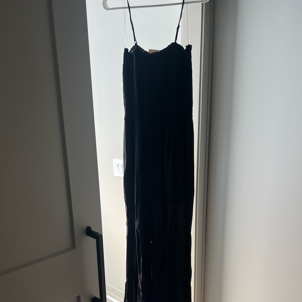 Black wide leg jumpsuit with spaghetti straps